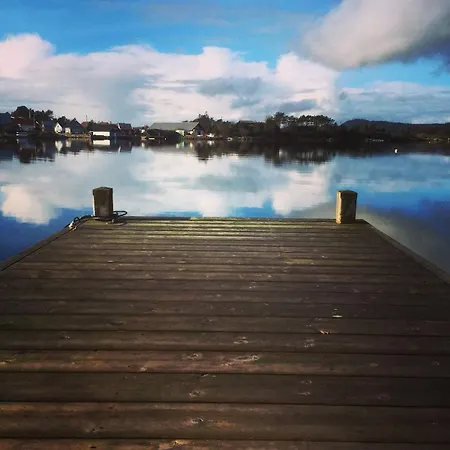 Idyllic On The Waterfront With Boat 크리스티안산